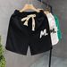Pantaloncini casual da uomo, estivi, larghi, con stampa a lettere, ad asciugatura rapida, con elastico in vita, per palestra, corsa e viaggi (nero, verde, bianco)_voghion.com