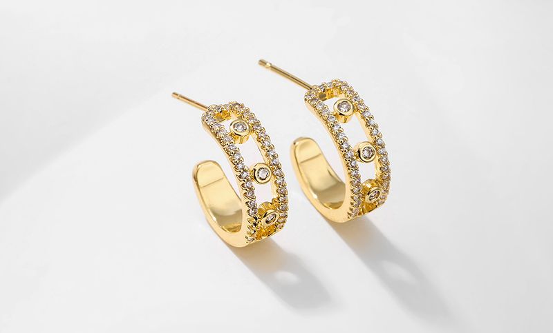 Famous classic temperament small dewdrop zircon ear clip female gold plated European and American diamond hollow musical note earrings_voghion.com