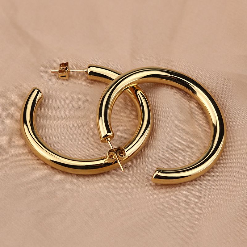 Novos brincos modernos e minimalistas com brincos de fio oco, joias de orelha com fivela de aço de titânio para mulheres_voghion.com
