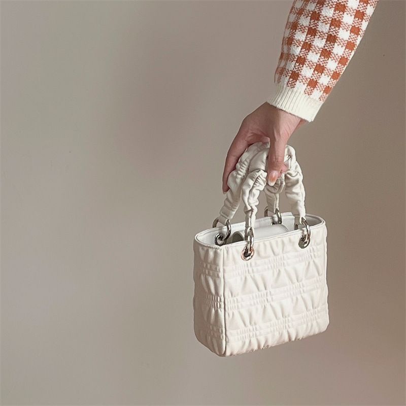 Borsa a tracolla classica versatile con tracolla singola, borsa a mano plissettata con motivo nuvola testurizzata, nuova borsa Daifei francese da donna 2024_voghion.com