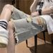Ausgewaschene Denim-Shorts im Used-Look, trendige Sommer-Freizeithose für Herren im amerikanischen Stil, mit Design-Feeling und gerüschtem Rand_voghion.com