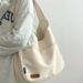 Minimalist Large Capacity Student Tote Spring New Fashion Simple Shoulder Handheld Casual Class Canvas Bag_voghion.com
