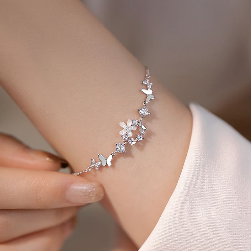 Eingelegter Diamant-Blumenring mit Schmetterlingsarmband für Damen, schlichter Nischenwaldstil, High-End-Designsinn, leichter Luxus_voghion.com