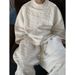 Completo sportivo bianco latte con stampa jacquard, design di nicchia di marca alla moda, felpa ampia, pantaloni casual, set da due pezzi_voghion.com