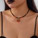 Collana di perline di miglio all'ingrosso, accessori di Halloween in stile gotico scuro europeo e americano, collana con clavicola, zucca, gatto e ragno per le donne_voghion.com