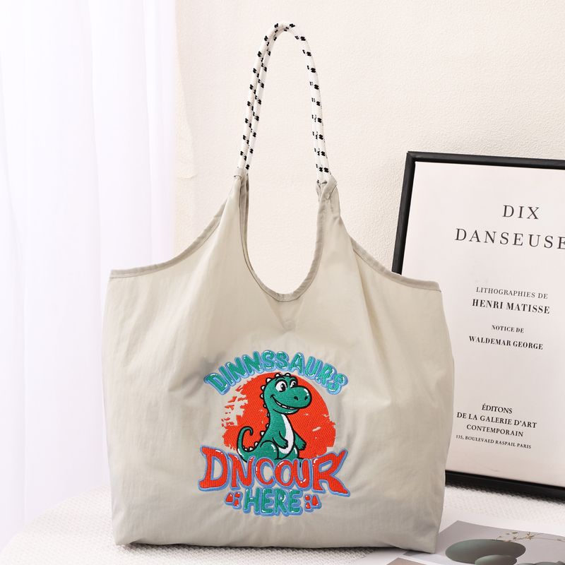 Neue Cartoon-Handtasche für Damen, bestickt, Nylon, große Kapazität, Shopping, vielseitige Pendler-Mode-Umhängetasche_voghion.com