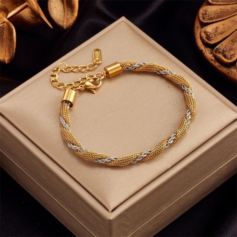 European And American Cross-border Creative Personality Simple Titanium Steel Contrast Color Twist Two-color Hollow_voghion.com