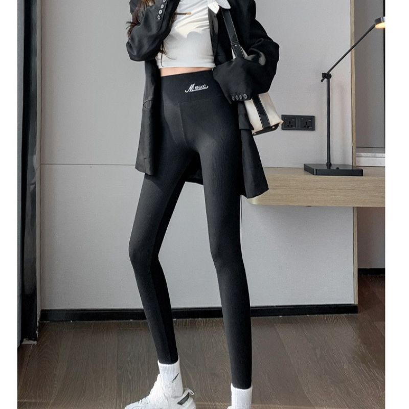 Leggings da donna a vita alta, elastici, snellenti e modellanti con gamba affusolata; adatti per essere indossati_voghion.com