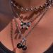 Sweater Necklace Wholesale European And American Ins Cherry Bow Pendant Hip Hop Punk Skull Halloween Clavicle Chain_voghion.com