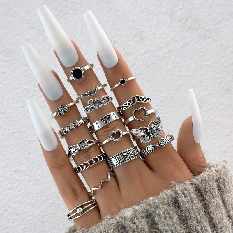 Set di anelli impilabili per nocche con occhio di serpente, punk vintage, farfalla, fiore e luna_voghion.com