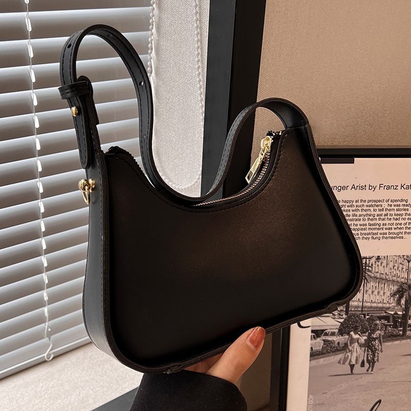 Nische Design Unterarm Tasche Jingle 2023 Neue Sommer Mode Tragbare Kleine Satchel high-level-sinn Messenger schulter tasche_voghion.com