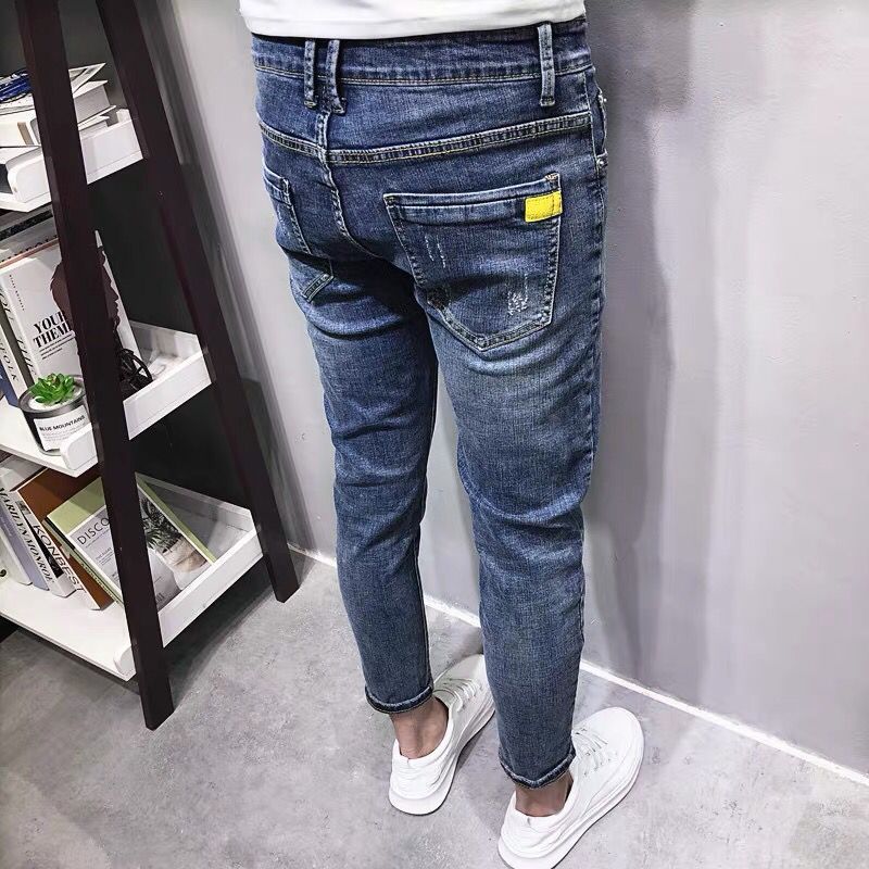 Jeans Ins Label Cat Beard Nine Point da uomo alla moda primavera/estate, nuova versione coreana, vestibilità attillata, pantaloni blu lavati a gamba piccola_voghion.com