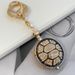 Porte-clés de voiture en forme de tortue avec pierre œil de chat incrustée de diamants, coloré et créatif_voghion.com