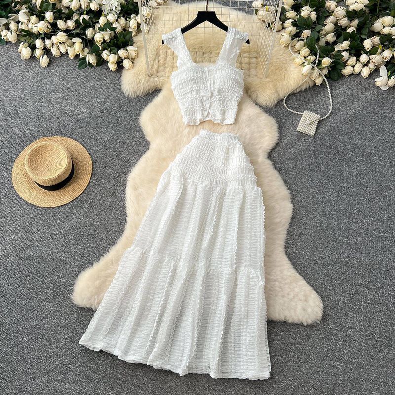 Fresh Spring And Summer Vacation Style Short Small Flying Sleeve Suspender Top + High Waist Pleated Skirt Two-piece Suit_voghion.com