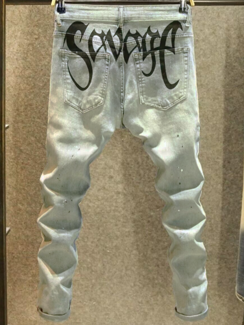 Calça jeans masculina moderna com respingos de tinta, corte slim elástico e estampa personalizada, calça comprida skinny masculina_voghion.com
