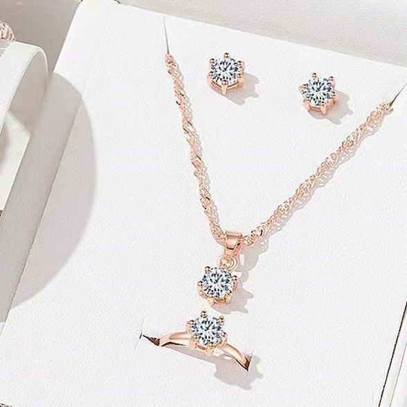 Semplice set di orecchini pendenti in zircone rotondo, anello, collana versatile in tre pezzi per donna_voghion.com