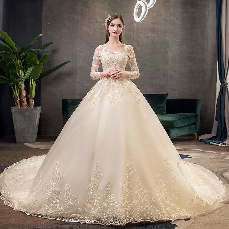 Champagne Lace Long Sleeve Wedding Dress With Cathedral Train, Plus Size Bridal Gown For Elegant Bride, Flowy A-Line Silhouette_voghion.com