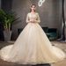Champagne Lace Long Sleeve Wedding Dress With Cathedral Train, Plus Size Bridal Gown For Elegant Bride, Flowy A-Line Silhouette_voghion.com