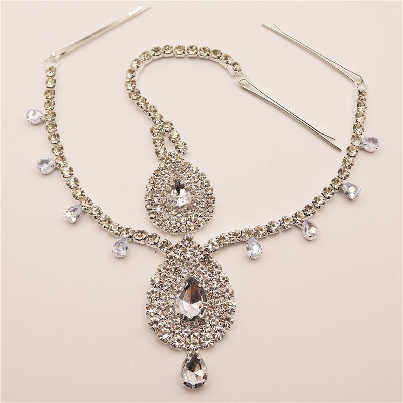 Elegante copricapo con catena a forma di goccia d'acqua per spose, feste e occasioni speciali - Design a farfalla con strass, oro e argento_voghion.com