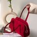 Borsa a tracolla piccola in pelle scamosciata con texture di nicchia di alta qualità, nuova tendenza 2024 per le donne da sposa rosse_voghion.com