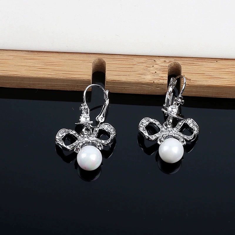Impératrice douairière Xi, pleine de diamants, patchwork d'arcs et de perles, boucles d'oreilles Saturne, luxe léger, sens haut de gamme,_voghion.com