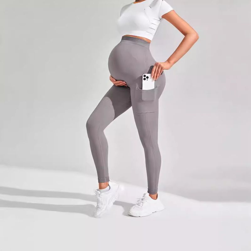 Pure Wei női barna jóga nadrág zsebekkel, kismamanadrág, kényelmes terhesség alatt, egyszínű leggings_voghion.com