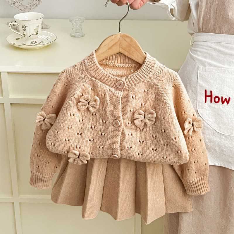 2025 New Girls Knitted Sweater Two Piece Korean Round Neck Solid Color Bowknot Hollow Single Breasted Suit Skirt_voghion.com