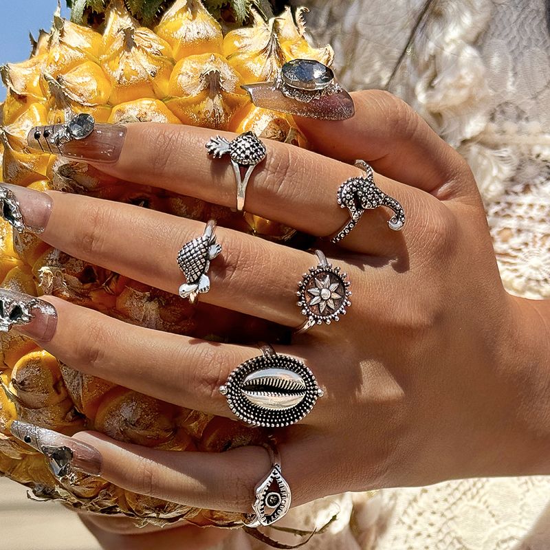 Böhmisches Ringset mit Seestern, Jakobsmuschel, Strandstil, Kokosnussbaum, Schmetterling, geschnitzt_voghion.com