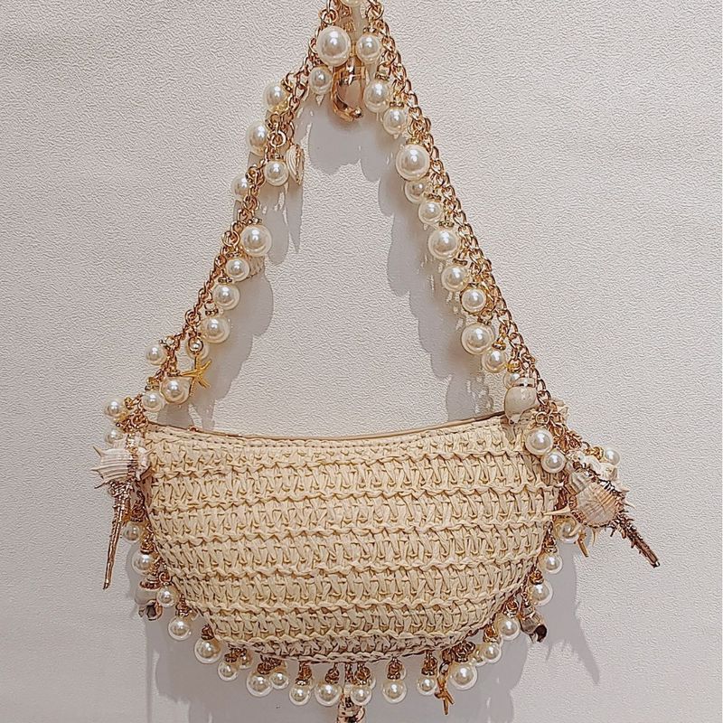 Bolsos de mujer Primavera y verano Nuevo Bolso de paja con perlas y conchas que combina con todo Bolso tejido Bolso de mujer para vacaciones en la playa Tendencia_voghion.com