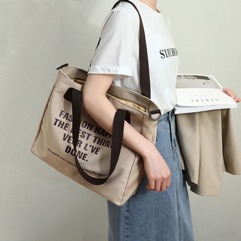 Tote Bag Lazy Wind Canvas Grande capacità 2023 Nuova borsa per pendolari per studenti di nicchia Borsa a tracolla di alta qualità_voghion.com