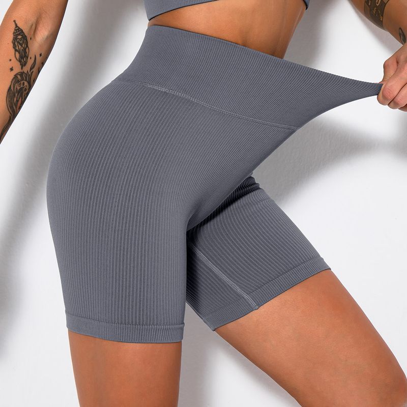 Seamless solid color thread tight fitting waisted high elastic hip lifting yoga pants, sports running fitness pants_voghion.com