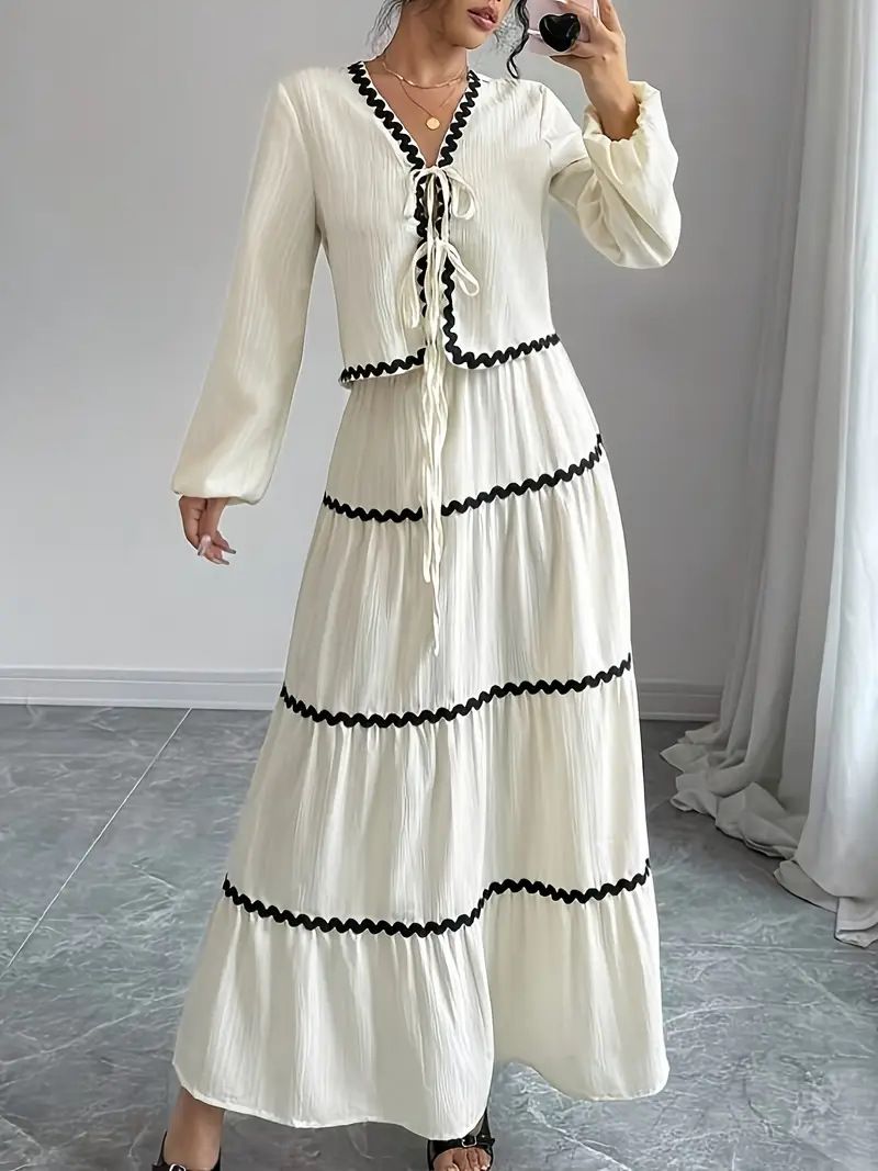 Completo da donna con gonna e camicia a fiocco, maniche a lanterna plissettate e pizzo a strati_voghion.com