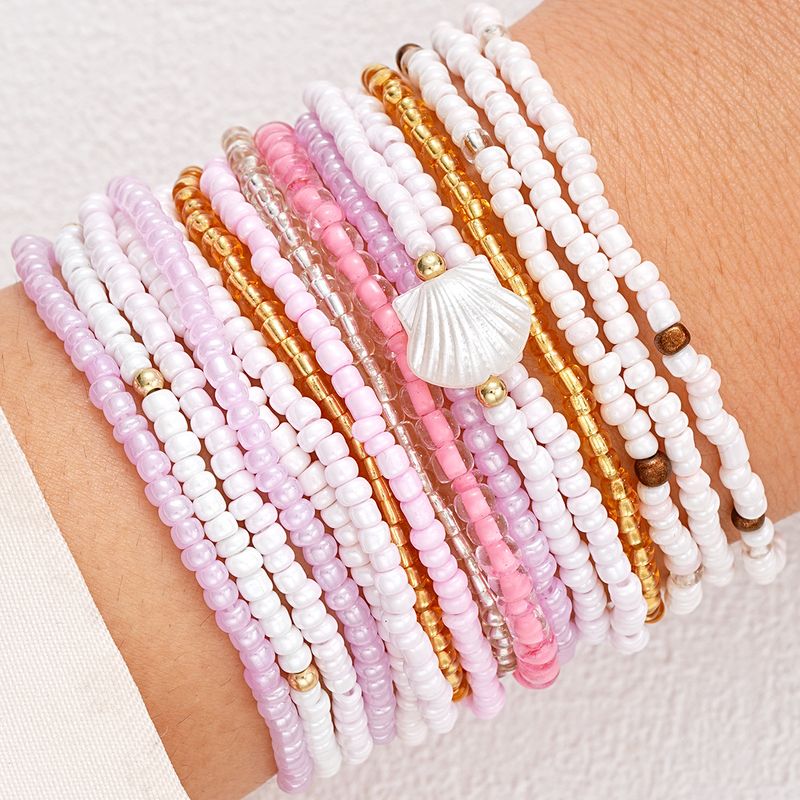 European and American cross border new hand woven Bohemian style colorful beaded multi layer rice bead shell bracelet 17 piece set_voghion.com