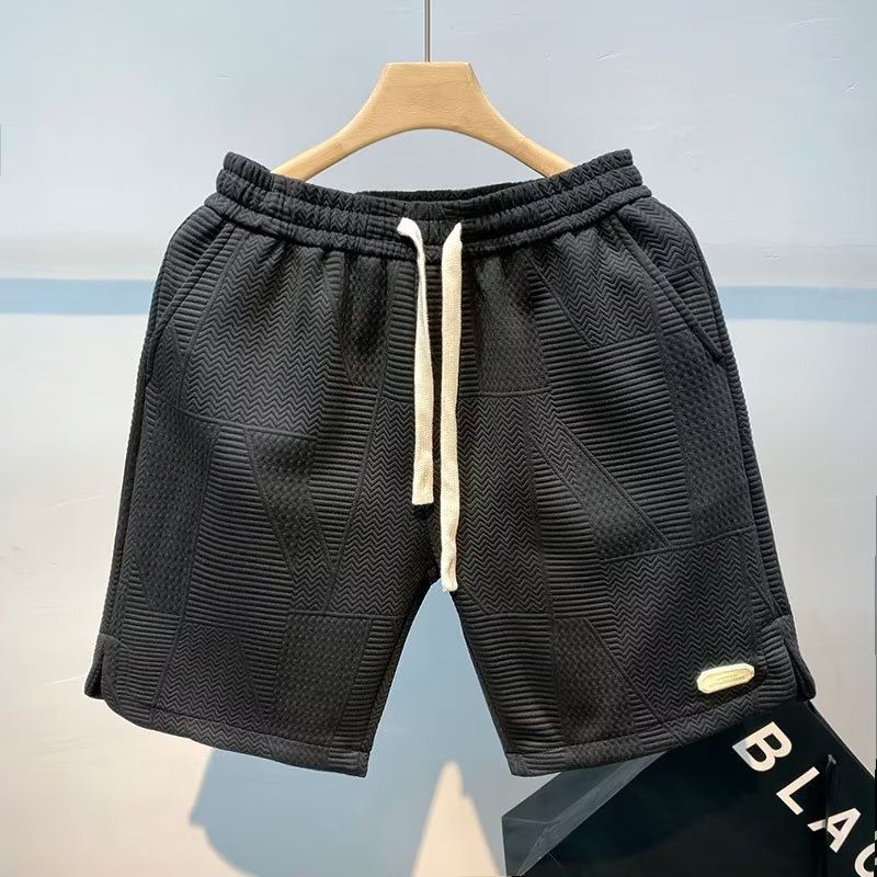Abbigliamento maschile Pantaloncini ondulati Design estivo Nicchia Casual Pantaloni da spiaggia a cinque punti Pantaloni sportivi da strada Pantaloni dritti_voghion.com