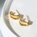 Sier C- Shaped Twisted Women's Light Niche High-end Design Ear Buckle Elegant Fashion All-match Earrings_voghion.com
