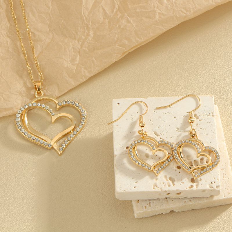Set di gioielli in zircone a forma di cuore con intarsi traforati in rame, placcato in oro rosa, placcato in oro bianco_voghion.com