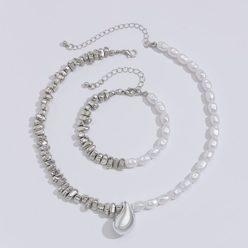 Collana con goccia d'acqua in metallo lucido Design Sense per donna, set di gioielli con bracciale di perline irregolari_voghion.com