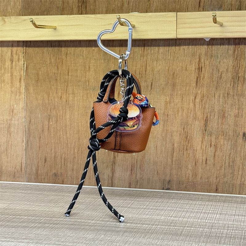 Mini ciondolo trendy per borsa a secchiello - accessorio in corda intrecciata a mano per coppie, elegante decorazione fai da te per borsa a tracolla in più colori_voghion.com