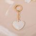 Chaveiro de flor com coração de pérola, novo, simples, bolsa de luxo, capa para fone de ouvido, telefone, CDD, pingente_voghion.com