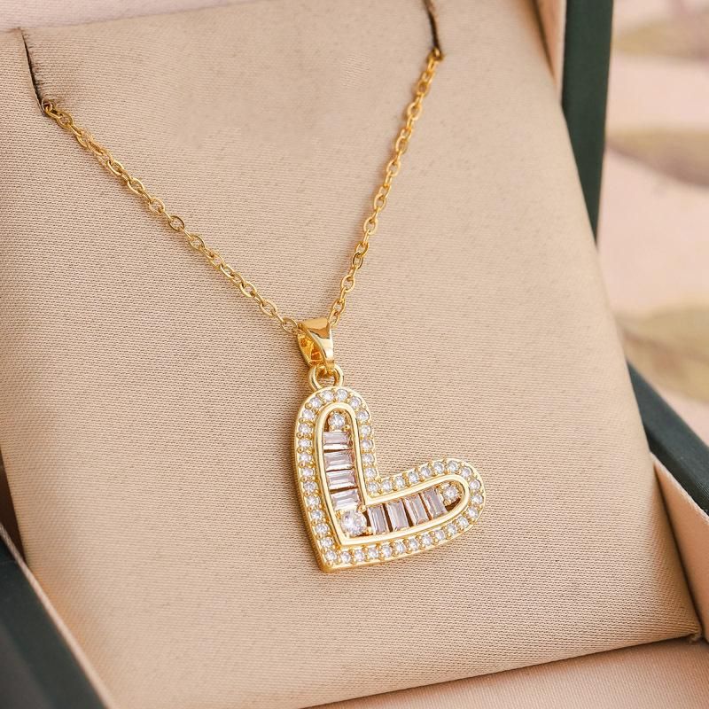 Collana con ciondolo a forma di cuore cavo in zirconia piena color oro in acciaio inossidabile per donne e ragazze, gioielli da festa e amore_voghion.com