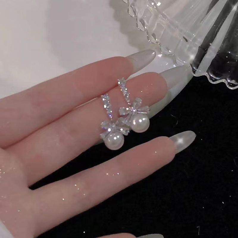 Damenohrringe - auf den ersten Blick ein Hingucker ~ Süße und sanfte Perlenohrringe mit Schleife, leichtes, luxuriöses Nischendesign, hochwertige und angesagte Ohrringe für Damen_voghion.com