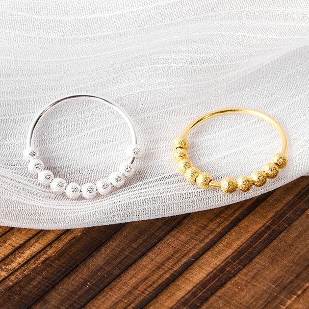 S argento puro con linee semplici rotazione delle perle per alleviare stress e ansia. Anello in argento_voghion.com