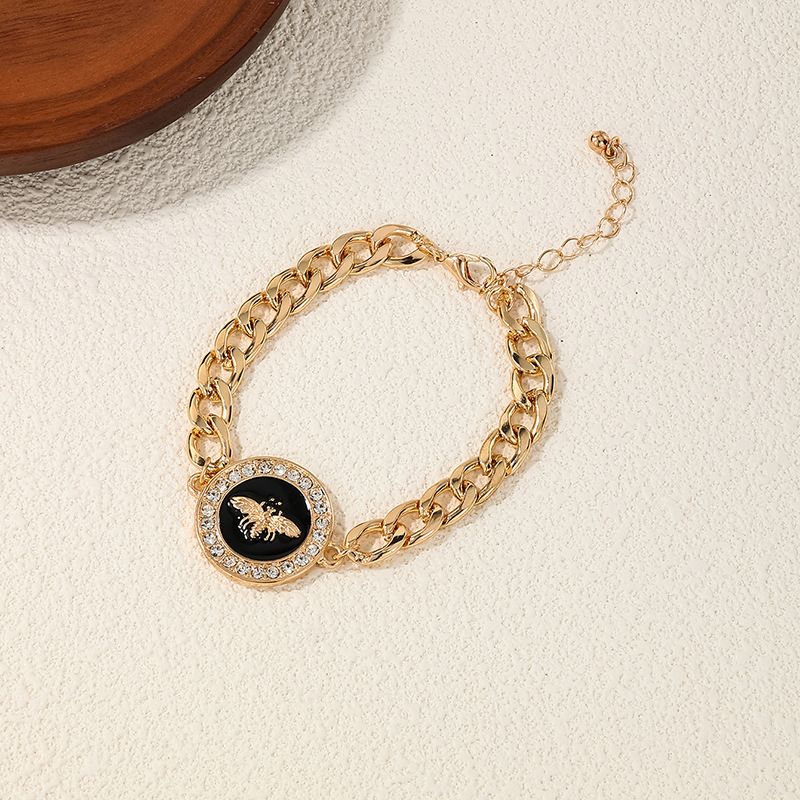 Bracciale unisex alla moda e personalizzato con motivo geometrico rotondo quadrato e leone color miele e diamanti_voghion.com