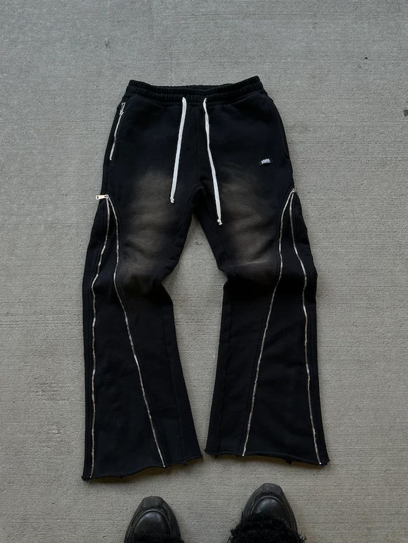 Vêtements pour femmes High Street Zipper Décoration Pantalons de sport vieillis Hommes et femmes Harajuku Hip Hop Pantalons de survêtement droits et amples Pantalons décontractés_voghion.com