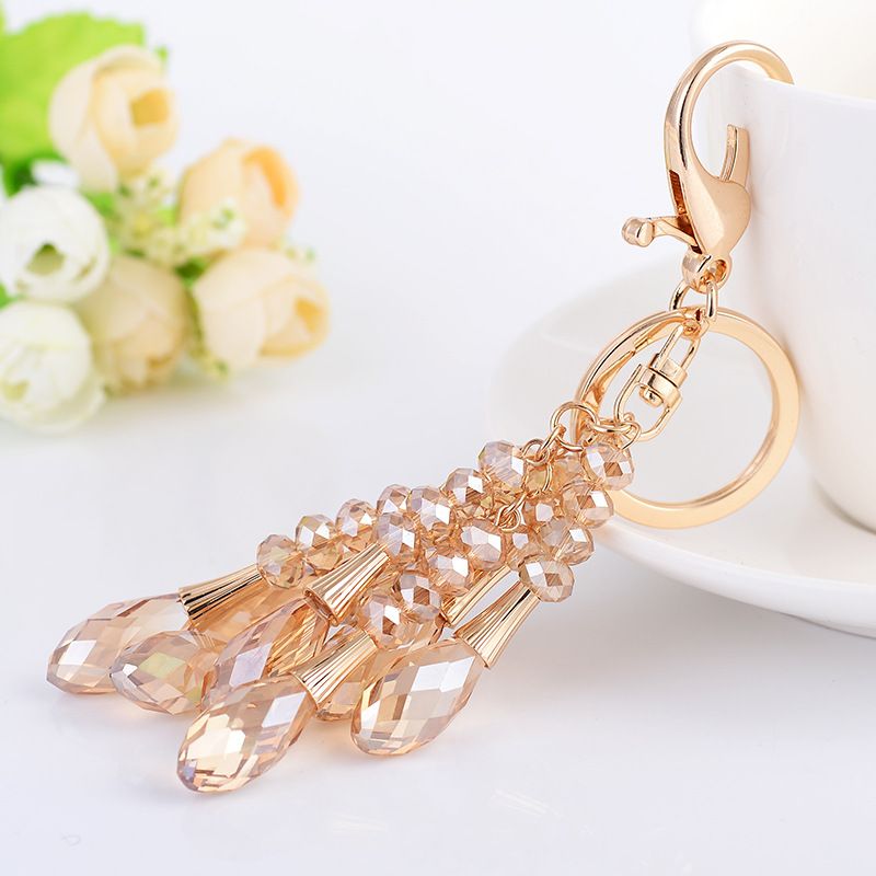 Elegante portachiavi a forma di goccia di cristallo - Elegante accessorio con perline per chiavi, borse e regali (bianco, grigio chiaro, champagne)_voghion.com
