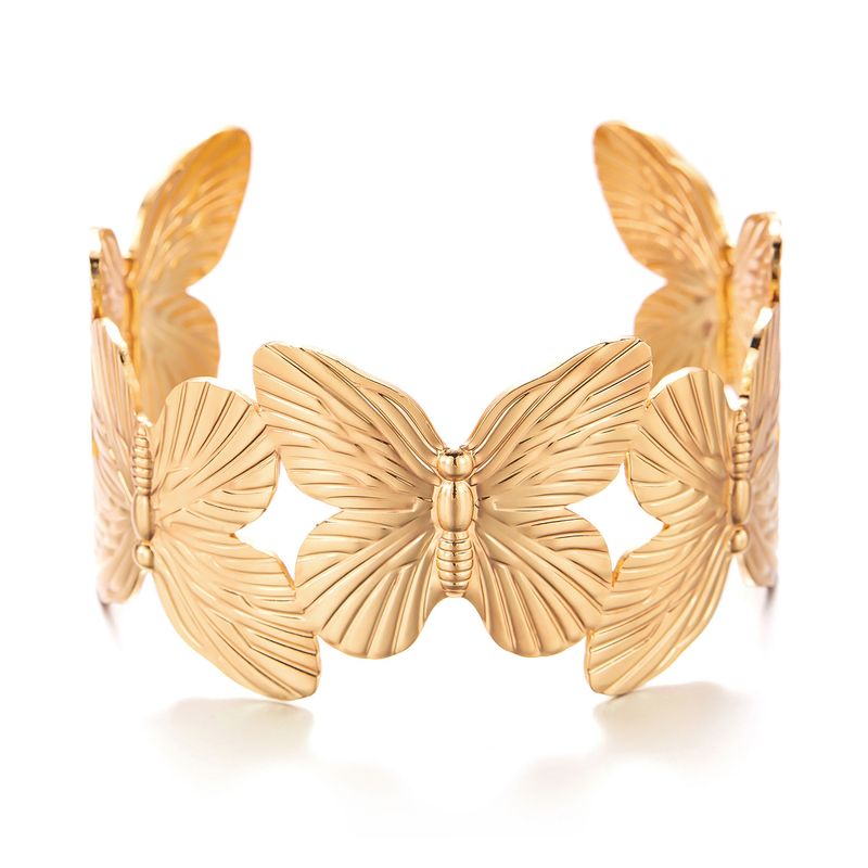 Braccialetto aperto versatile per vacanze estive in spiaggia con fiori a farfalla in oro_voghion.com