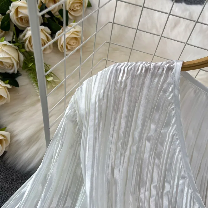 Vêtements pour femmes Costume à la mode, tempérament féminin, chemise brillante à manches longues et col en V avec ourlet en feuille de lotus pour femmes, jupe à paillettes taille haute_voghion.com