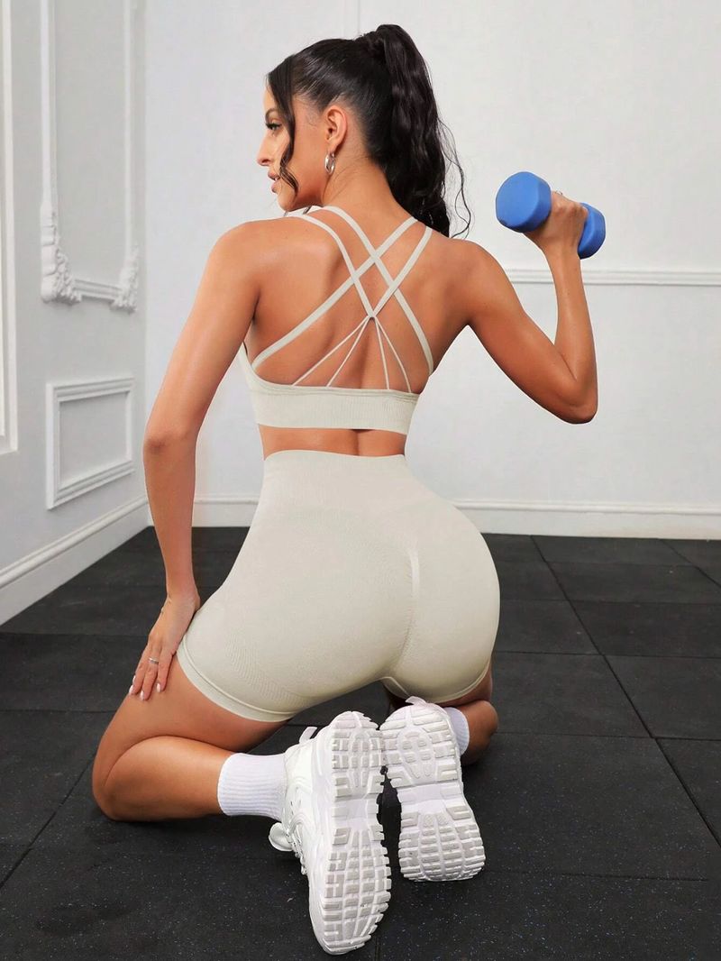 Ubrania damskie Nowe stroje do jogi z odkrytym pępkiem Biustonosze sportowe z krzyżowym tyłem Biustonosze amortyzujące do biegania, szybkoschnące ubrania fitness_voghion.com