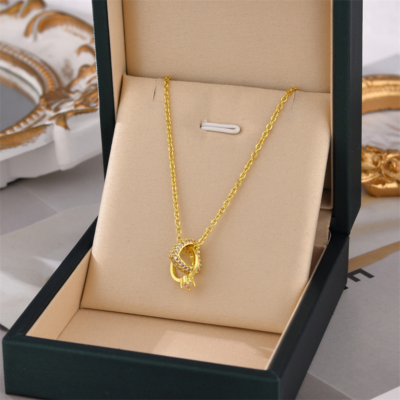 Collane di gioielli non sbiaditi Collana con ciondolo ad anello d'amore alla moda in acciaio inossidabile per coppia di donne_voghion.com