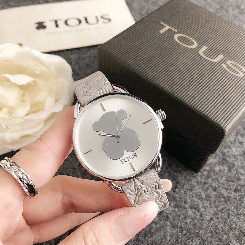 TS TO U'S Luxury Bear Co-branded Trendy Fashion Cinturino in pelle di agnello Quadrante argentato Orologio da polso impermeabile per uomo e donna 38,1MM Made in China_voghion.com